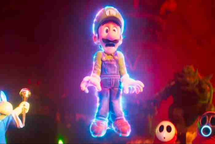 Luigi being held off the ground with magic The Super Mario Bros. Movie - Review