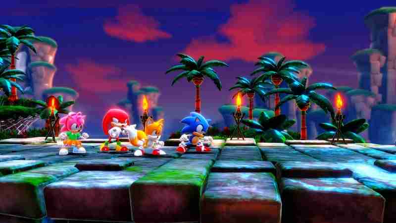 Amy, Knuckles, Tails and Sonic getting ready to start a level