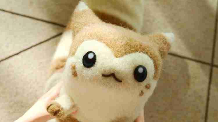 A friendly Furret looks into the camera with puppy-dog-eyes