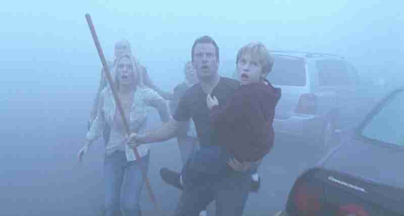 Scene from The Mist (2007) survivors try and flee through the fog