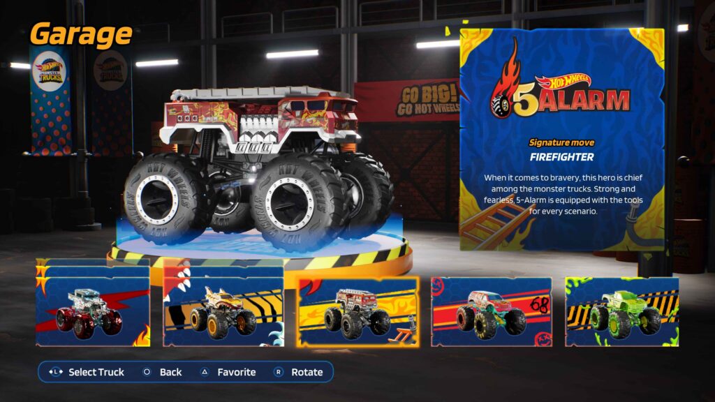 The garage to select your truck, currently showing a Fire Truck with monster wheels called 5Alarm