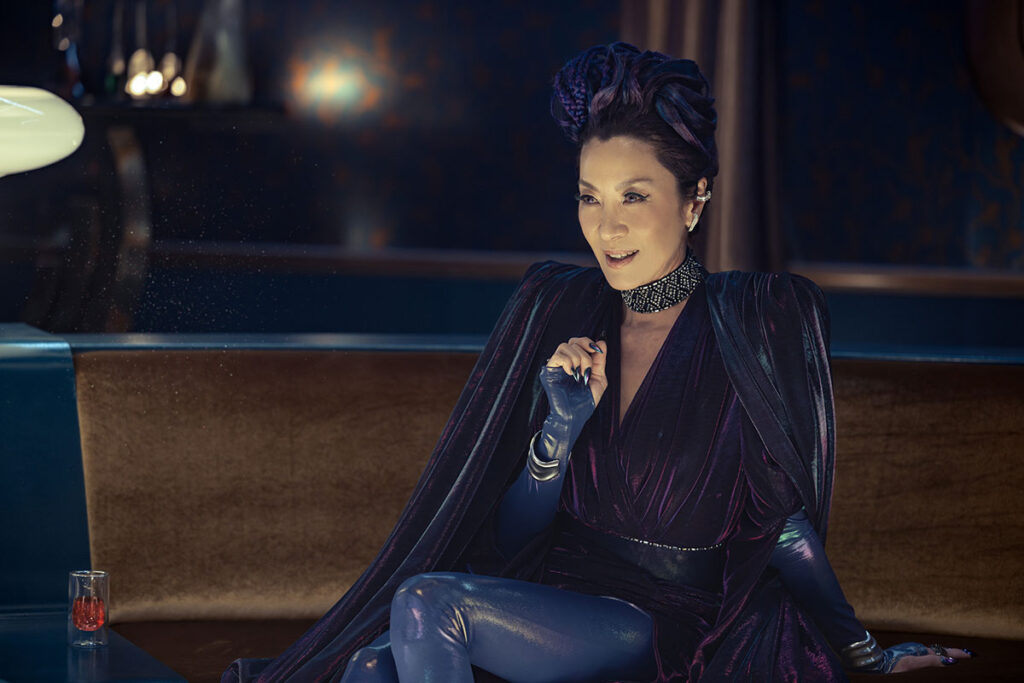 Michelle Yeoh's Georgiou sits in a dark bar/club - Star Trek: Section 31