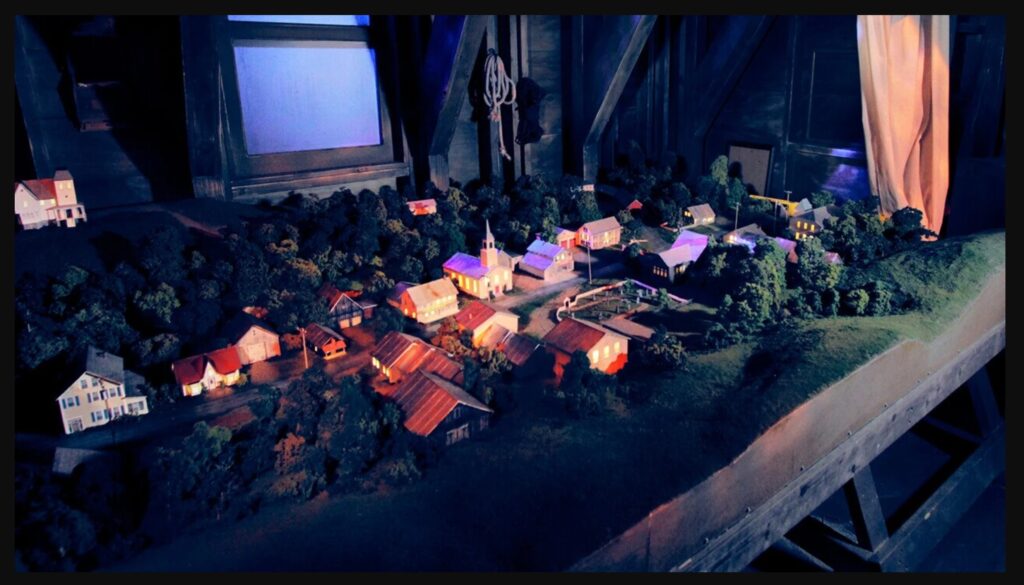 Adam Maitland's Model of the town, filled with gags & clues.