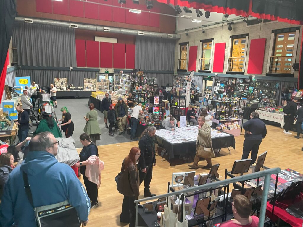 the back room filled with vendors - Comic Con 25