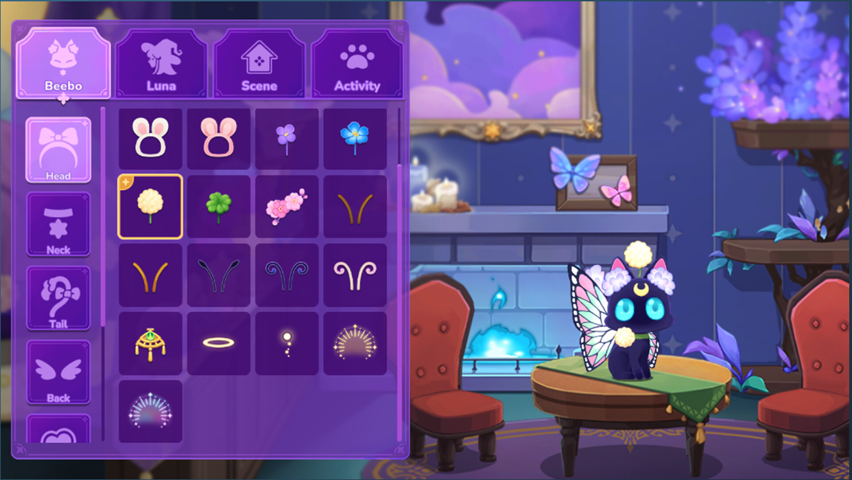 Shows an image of a cartoon style cat showing different outfits fo the game Beebo & Luna. They are sat on a table with butterfly wings on. 