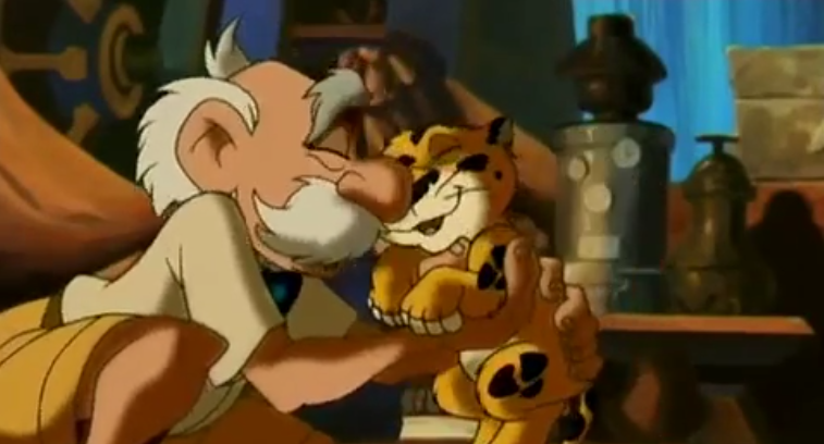 Professor Porter cuddling a leopard cub 