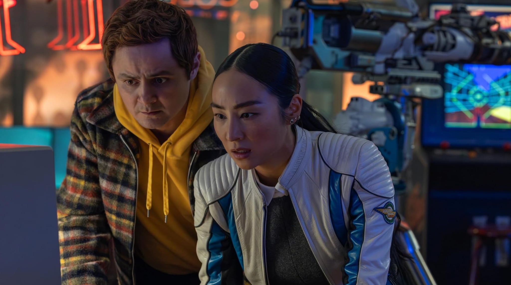 Tron: Ares - the "Good Guys" looking at a computer screen