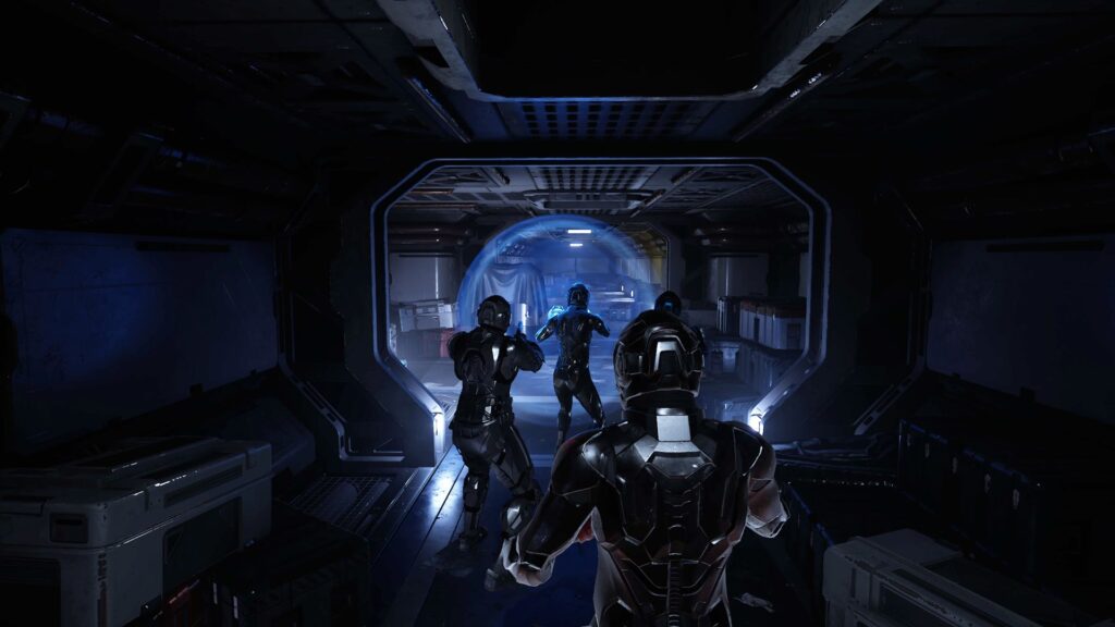 Species: Unknown - the team move as a unit through poorly lit corridors, with the person using the energy shield on point
