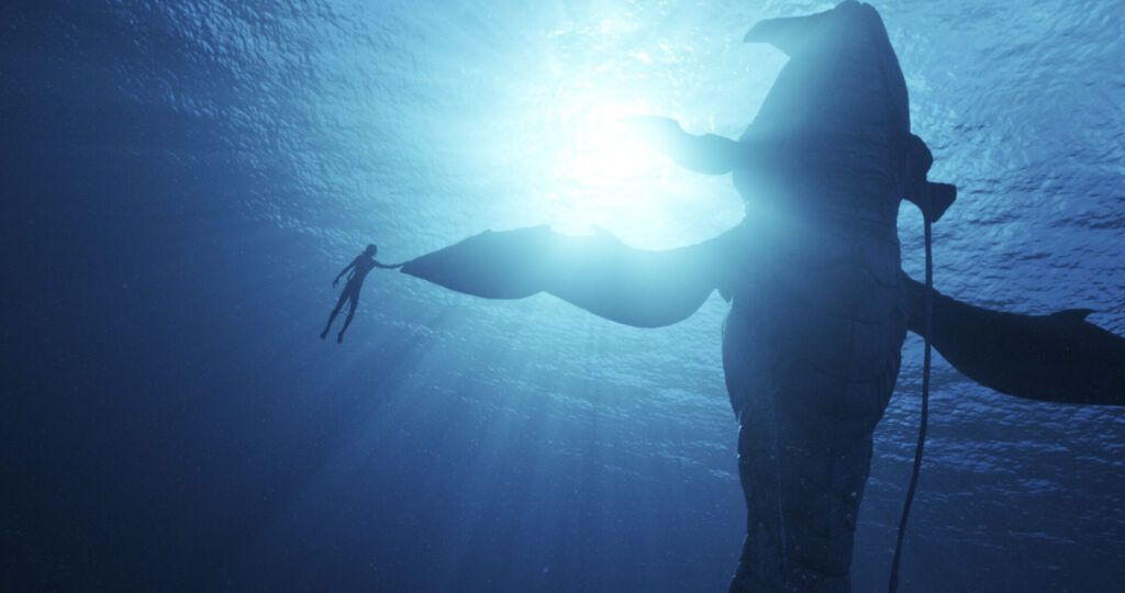 Lo'ak swiming with a Tulkun - Avatar: The Way of Water