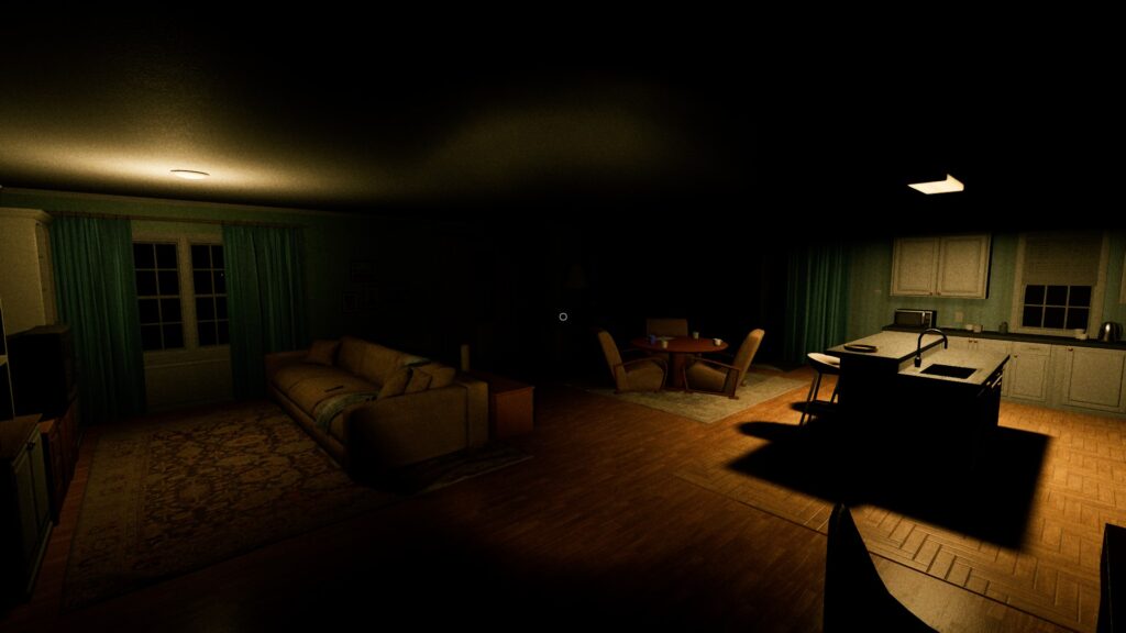 UFOPHILIA - A dark kitchenette and living space. The only lights are coming from the kitchen on the right, an island an the kitchen centre and stools at the island, and the living area on the left, a brown sofa with a TV and cabinet in front of it. A dining area can be seen between the two sides of the room.