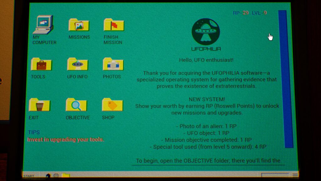 A laptop desktop screen. A green background with 9 different files on the left that provide different pieces of information on the game UFOPHILIA. To the right of the desktop is an image of a UFO and has some blurb of simple instructions for the game.