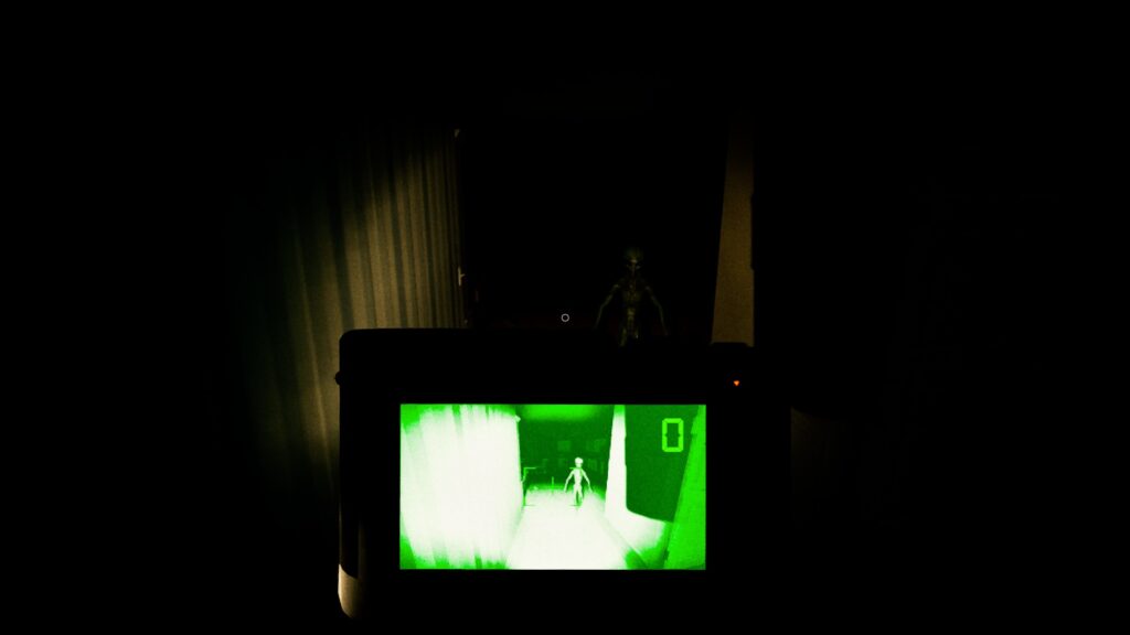 UFOPHILIA - A hallway in a house with striped wallpaper on the left wall. The only light is coming from a torch and the night vision of a camera at the bottom centre of the image. A dark green alien can be seen on the centre of the image facing the camera, which is also showing the alien on its screen.