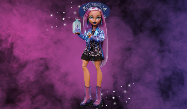 Monster High - A witchy doll holding a crystal , she has light purple hair with a purple and black short dress on. 