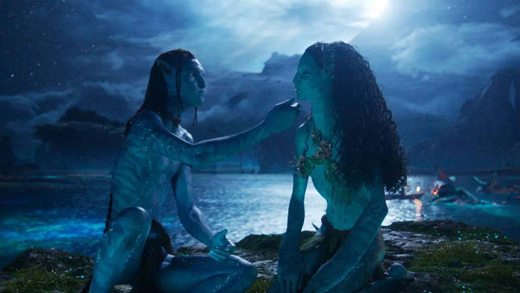 Lo'ak and Tsireya sitting by the water - Avatar  Fire and Ash