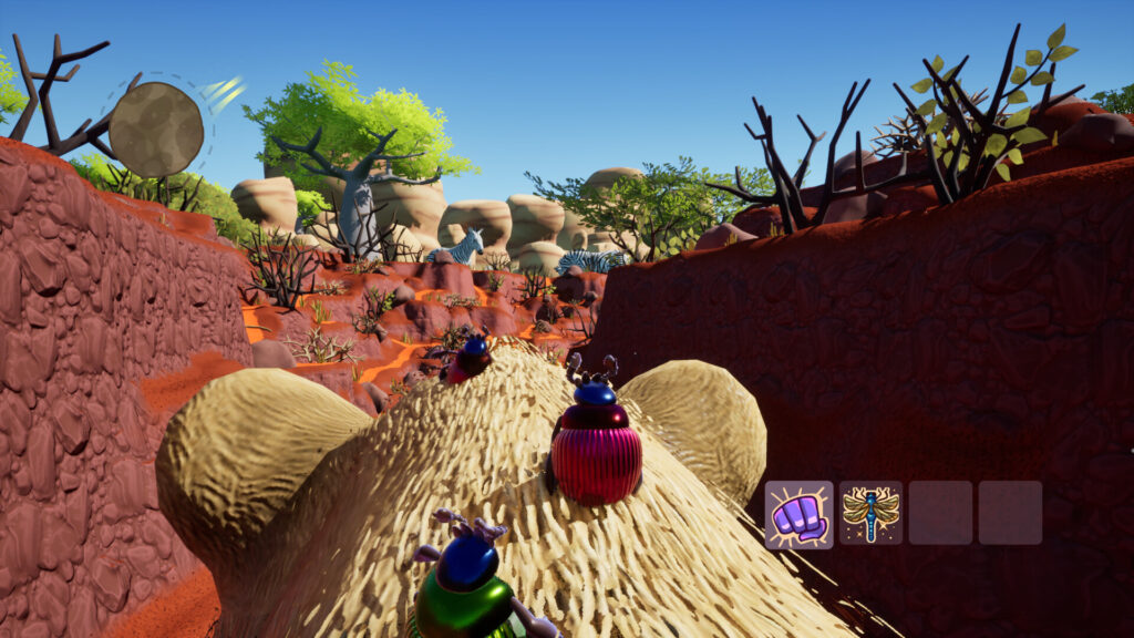 Dung Ho! - the team are riding the head of a lion, a zebra can bee seen in the background