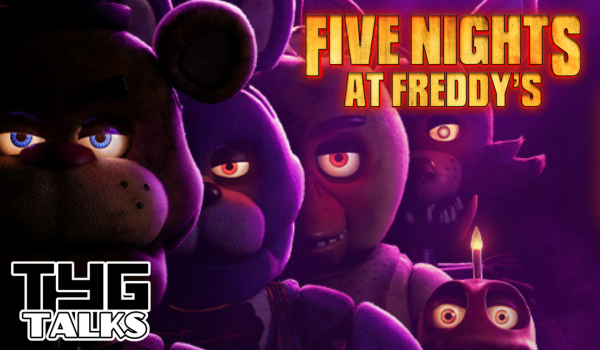 A line from left to right of four animal animatronics. Each stood behind the next, their eyes looking at the front. A bear, a rabbit, a chicken, a fox. A cupcake with eyes and a candle sits on the bottom right next to the chicken animatronic. There is a purple hue to the image.