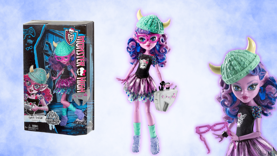 kjersti trollson monster high doll in and out of her box. She is a gamer troll with purple skin.