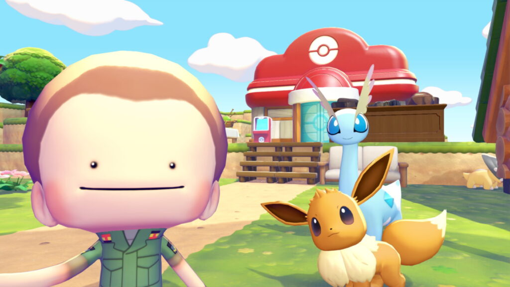Pokémon Pokopia - A ditto in human form, takes a selfie with an Eevee and another Pokémob. In the background is a Pokémon Centre.