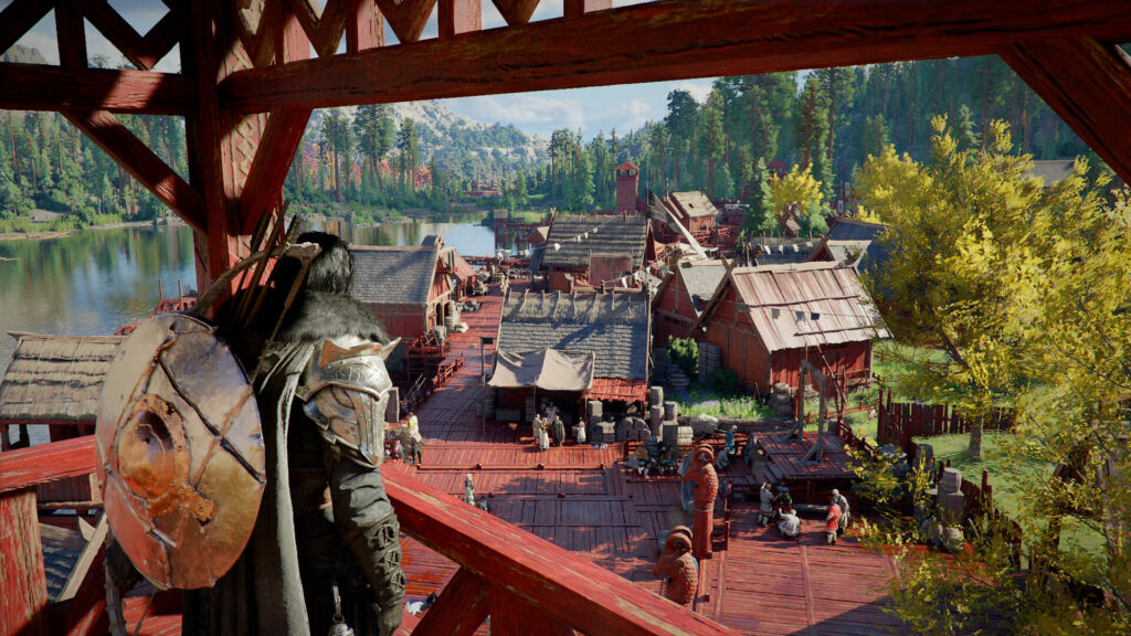 Crimson Desert - Kliff overlooks a riverside town nestled in nature, all the wood is painted red and all seems peaceful