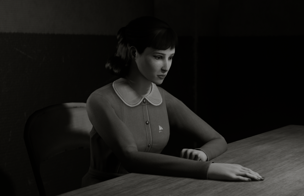 A black and white image of a woman sat at a desk. She is looking down with her right arm straight in front of her across the table, and her left arm bent inwards also resting on the table. This Bed We Made