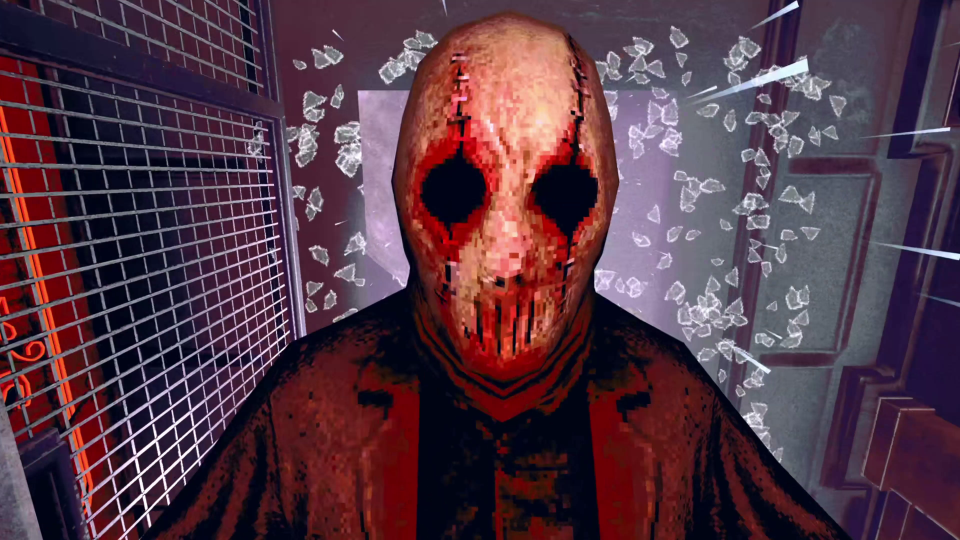 The Skin Stapler wearing a crudely made hessian mask close up to the camera, falling broken glass is behind him