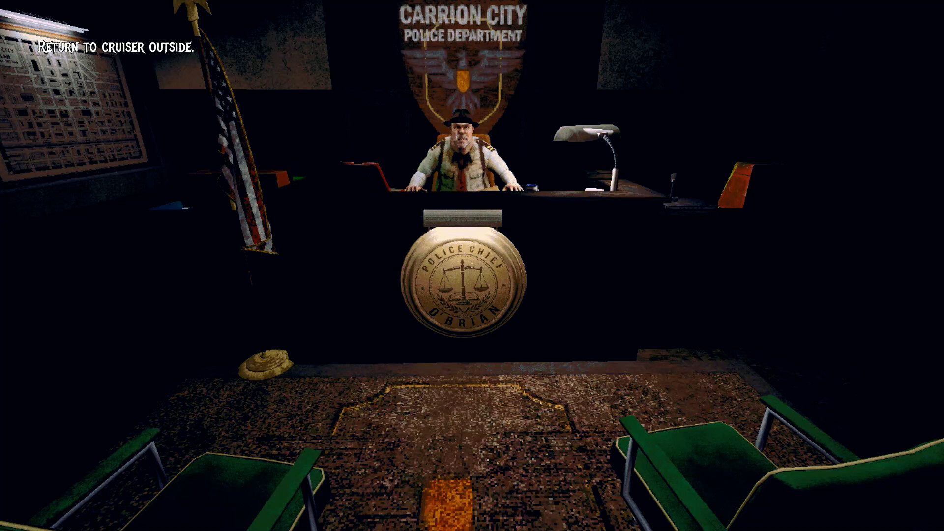 the chief of police sits behind his desk
