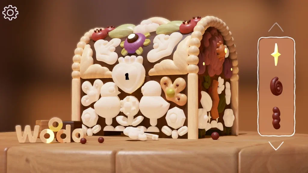 A wooden chest with some white areas waiting to be completed and others already coloured in with their puzzle pieces. The wooden blocks Woodo are stacked in front. 
